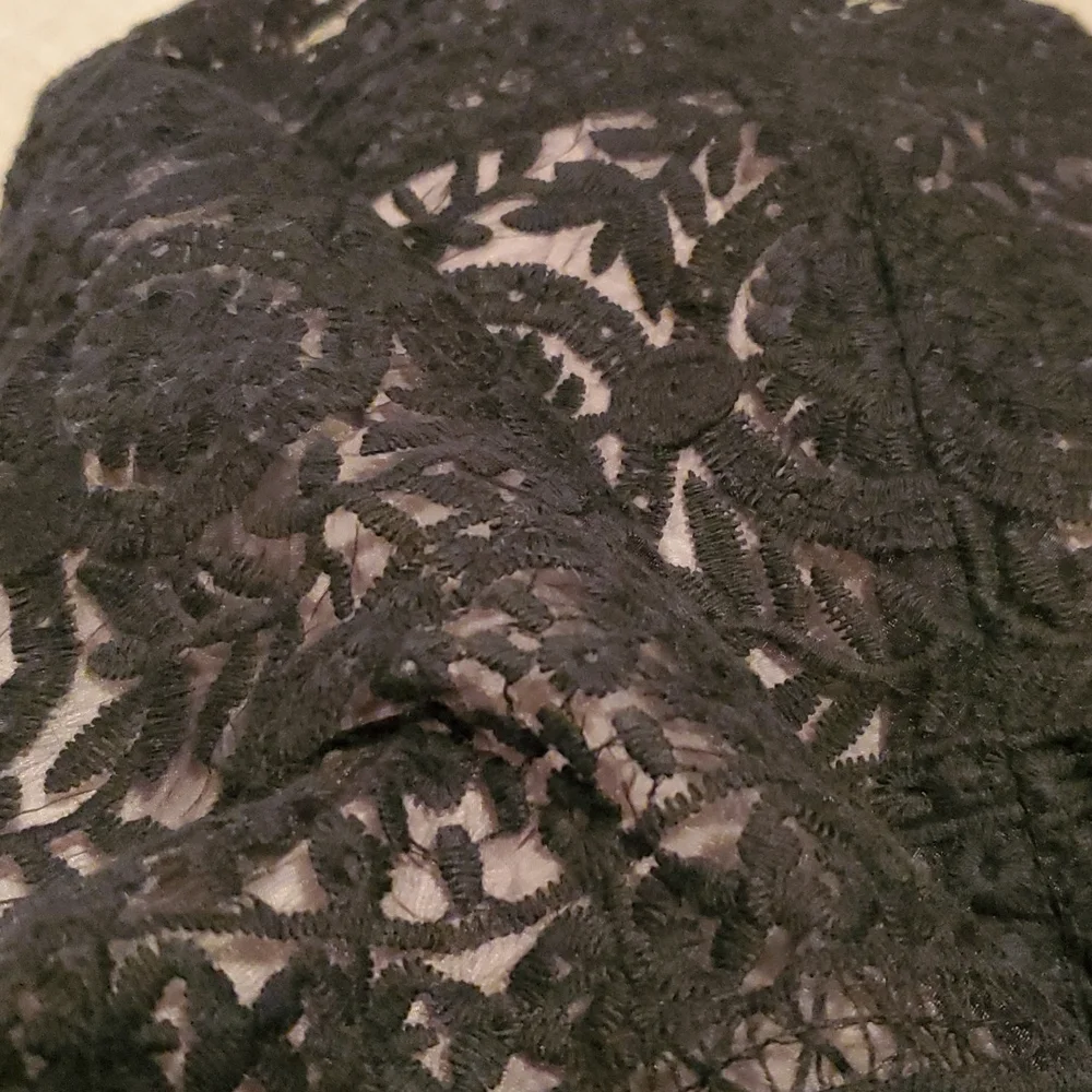 Soprano black with cream underlayer size small in like NEW condition